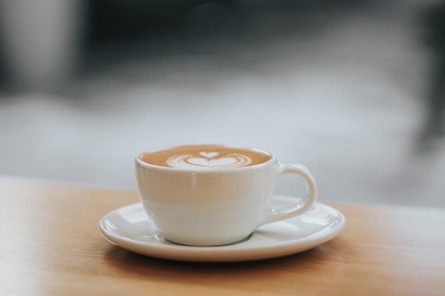 Free photo cup of coffee on table