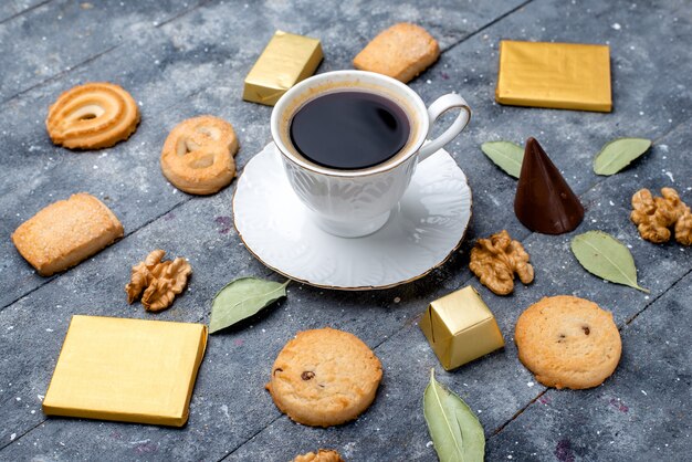 cup of coffee with cookies walnuts on grey, cookie biscuit sugar sweet