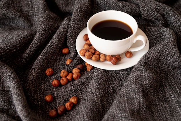 Cup of coffee with hazelnuts