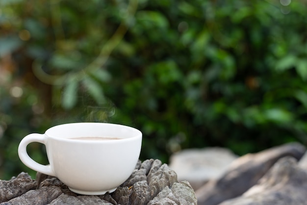 cup of coffee on wooden