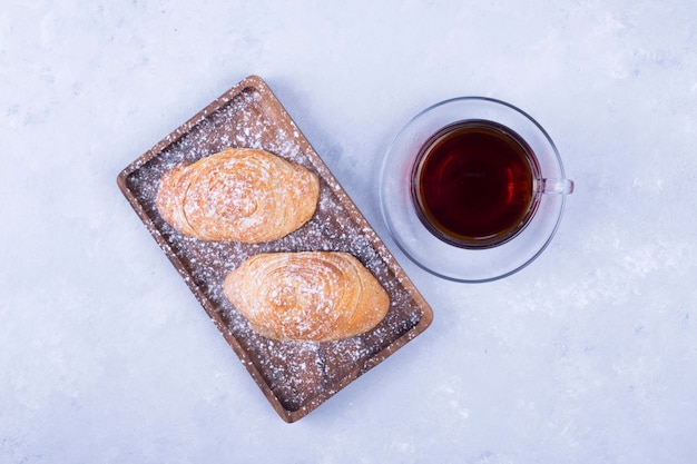 A cup of espresso with caucasian pastries,  top view