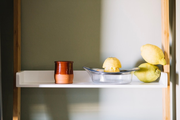 Cup and lemons