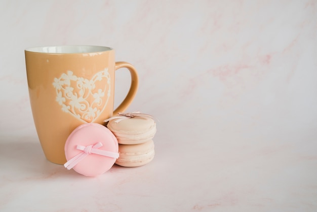 Cup and macaroons cookie