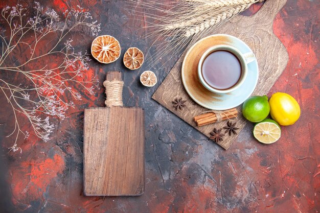 a cup of tea a cup of tea star anise lemons limes the wooden board