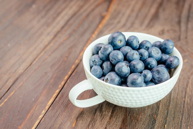 Cup with blueberries