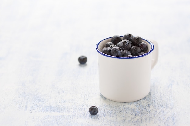 Cup with blueberries