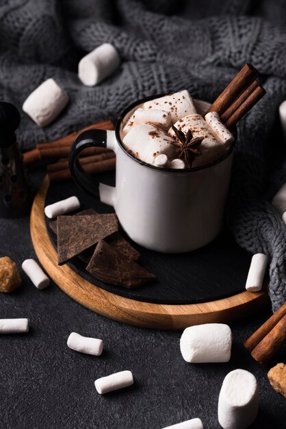 Cup with marshmallow drink cinnamon flavor