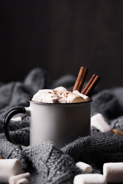 Cup with marshmallow drink cinnamon