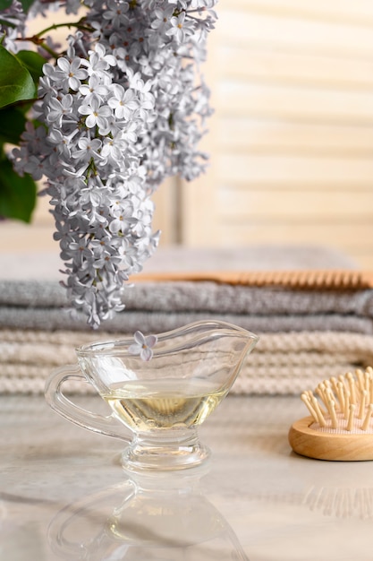 Cup with oil for hair