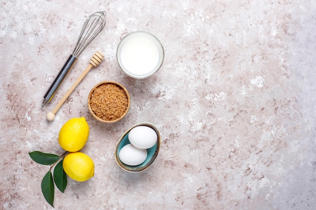 Cupcake baking background with kitchen utensils.