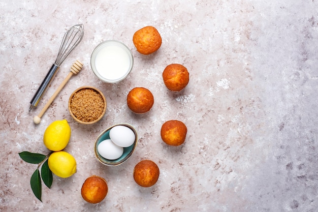 Cupcake baking background with kitchen utensils.