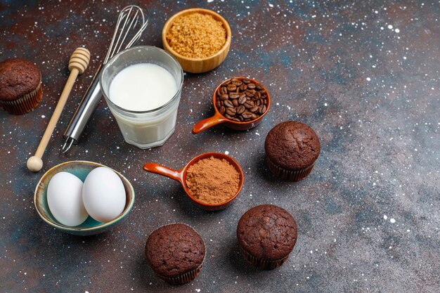 Cupcake baking background with kitchen utensils.