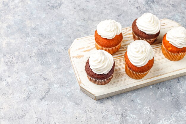 Cupcake baking background with kitchen utensils.