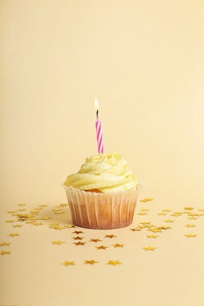 Cupcake with candle and stars