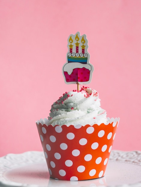 Cupcake with decoration on stick
