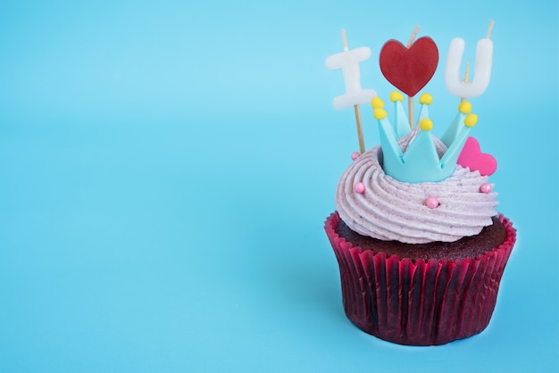 Free photo cupcake with i love you candle