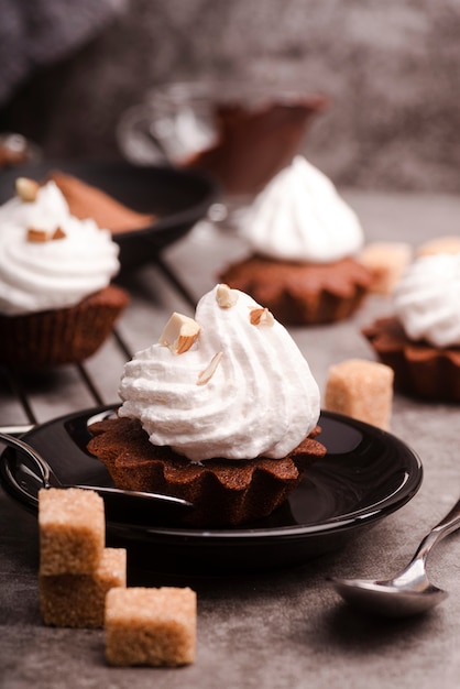 Cupcake with icing and sugar cubes