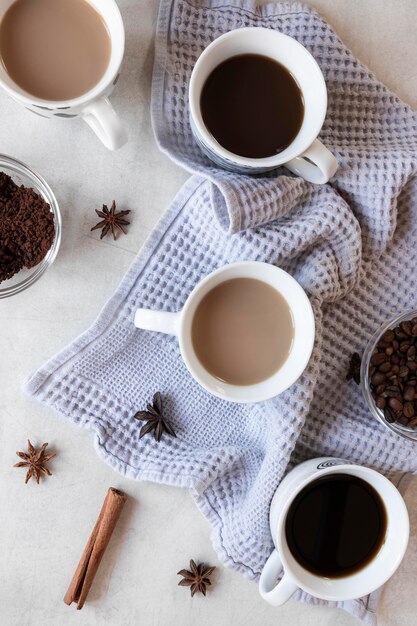 Cups of coffee on table