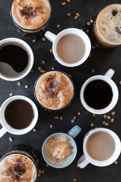 Cups of coffee on table