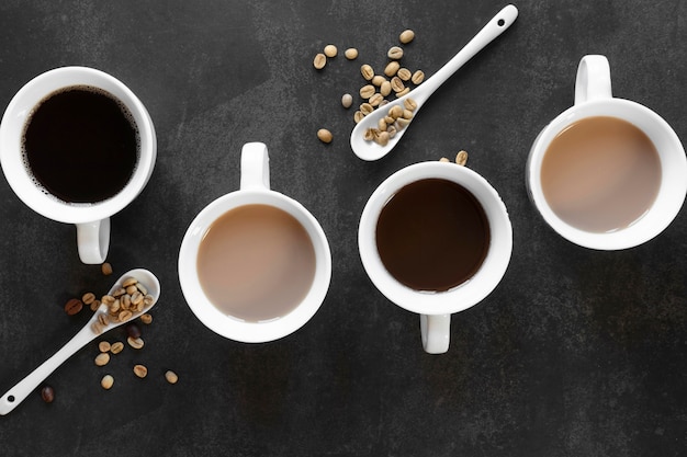 Cups of coffee on table