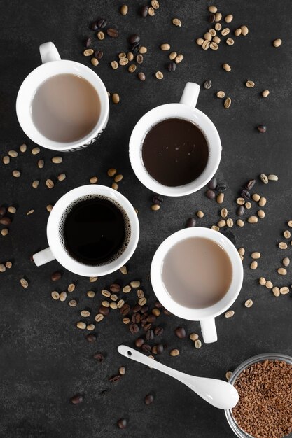 Cups of coffee on table