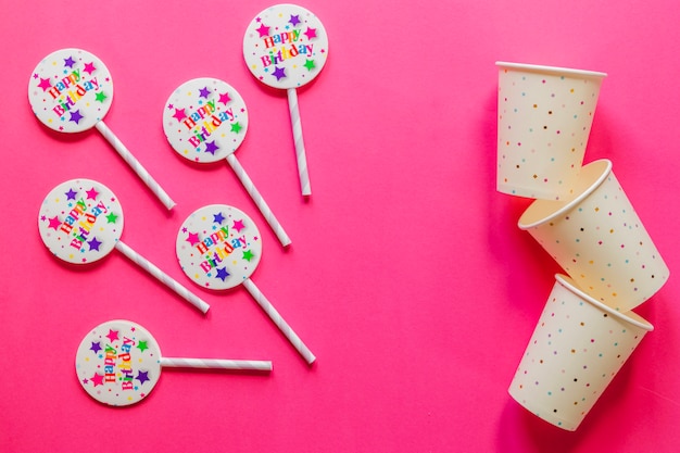 Cups and colorful straws