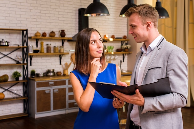 Free photo curious woman looking at a man