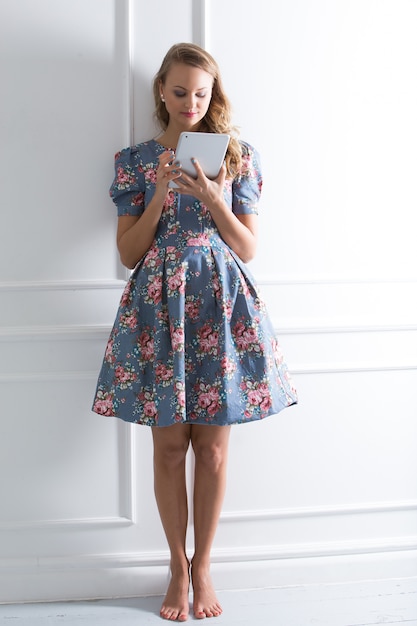 Curly girl in beautiful dress