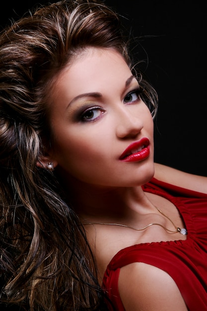 Free photo curly haired woman in red dress