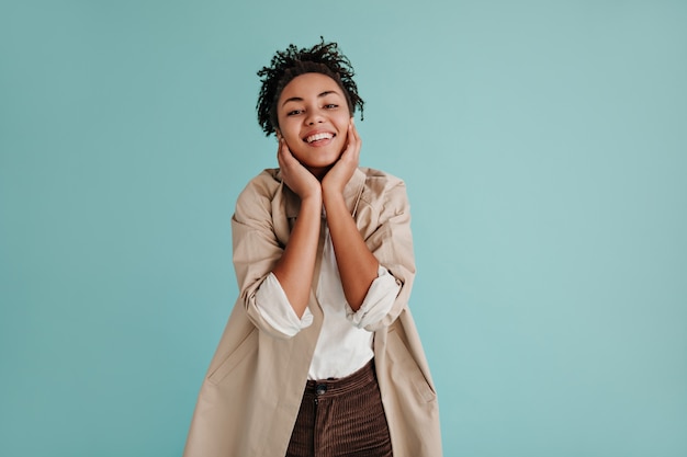 Curly model looking at front with smile