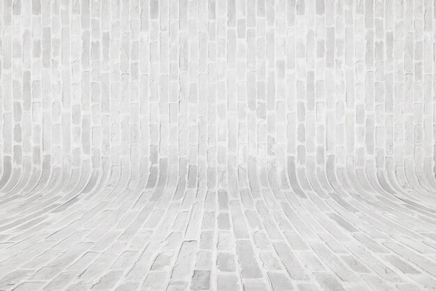 Изогнутая текстура стены из белого кирпича