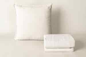 Free photo cushion cover, bed linen in natural fabric