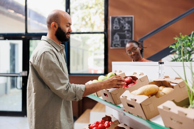 Customer searching for fresh produce