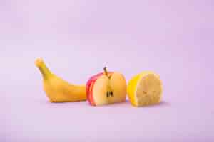 Free photo cut apple, banana and orange