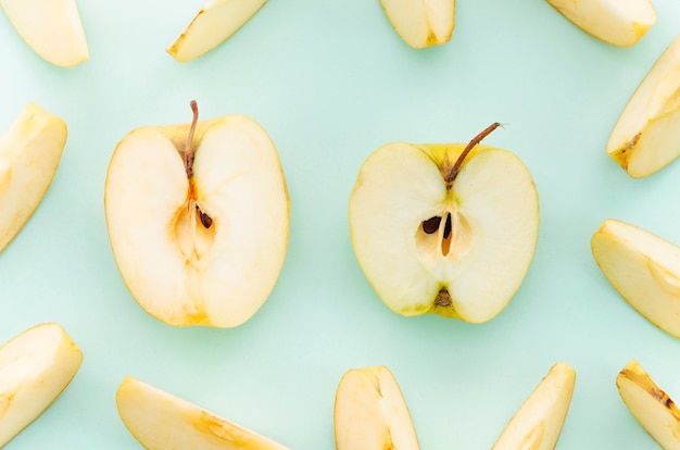 Cut apple on light surface