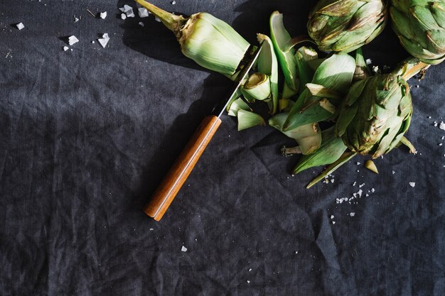 Cut artichokes and knife