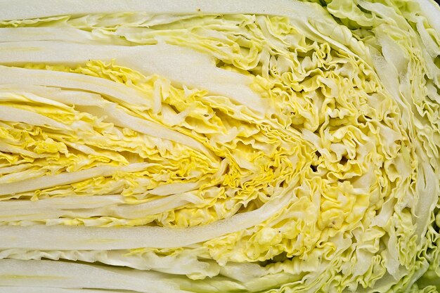 Cut of fresh Chinese cabbage, close-up. View from above. Fresh Chinese cabbage