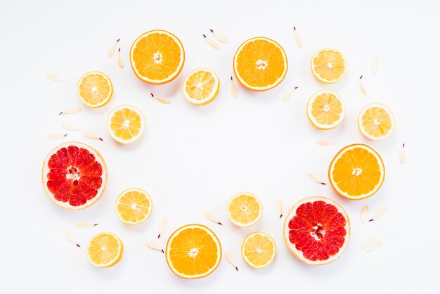 Cut of organic citrus fruits with petals