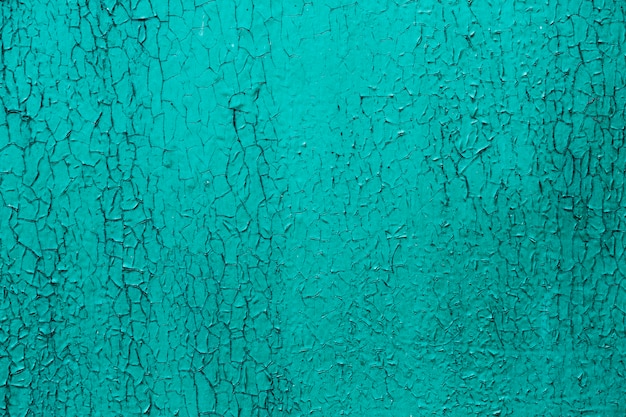 Cut out blue paint of a wall texture