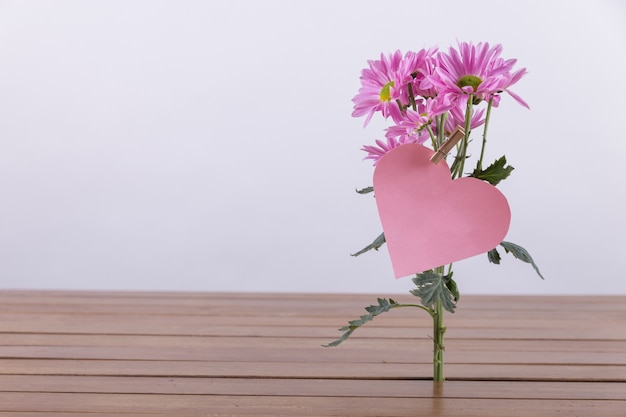 Free photo cut out heart on flower