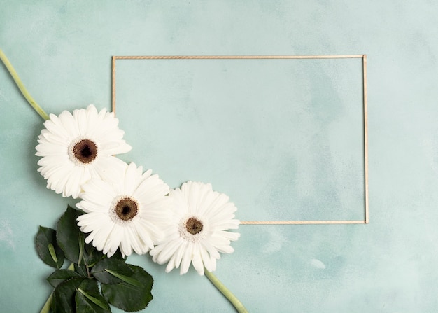 Cute arrangement of white fresh flowers and horizontal frame