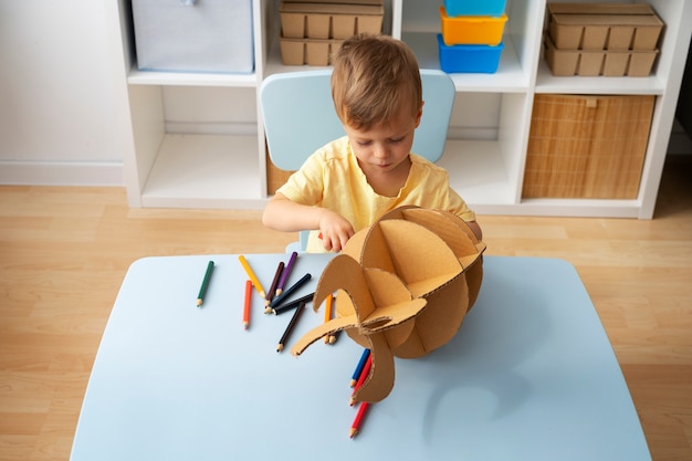 Cute astronaut kid playing