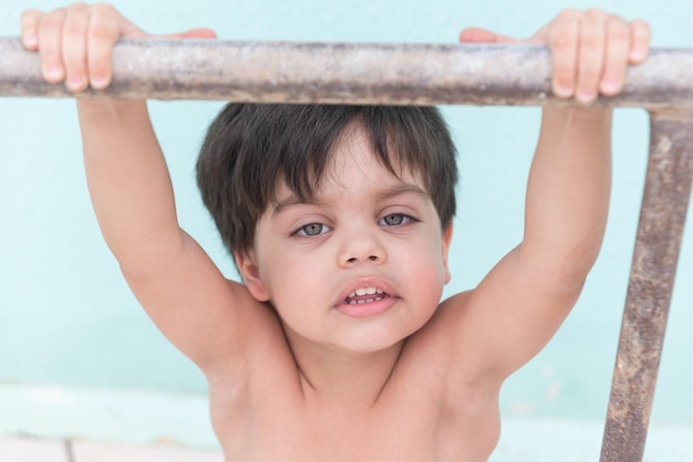 Free photo cute baby boy having fun outdoors