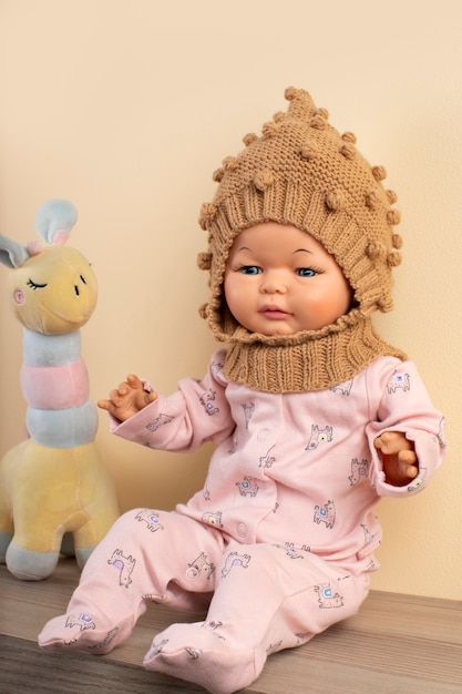 Free photo cute  baby doll for children still life