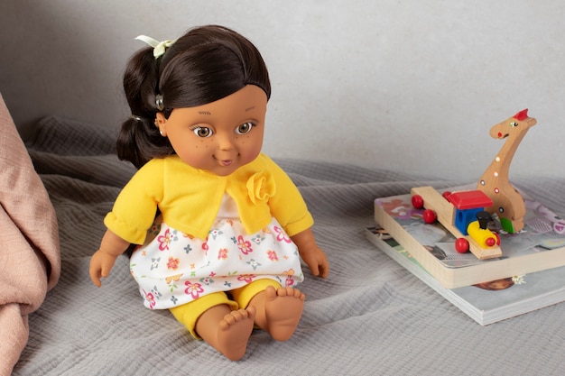 Free photo cute  baby doll for children still life