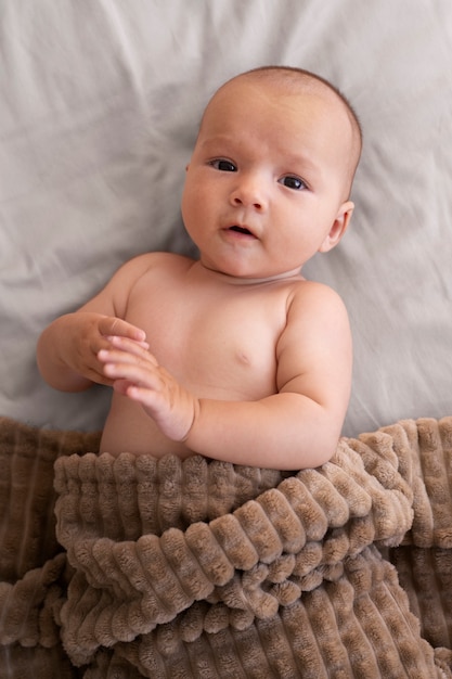 Cute baby dressed in santa claus clothing