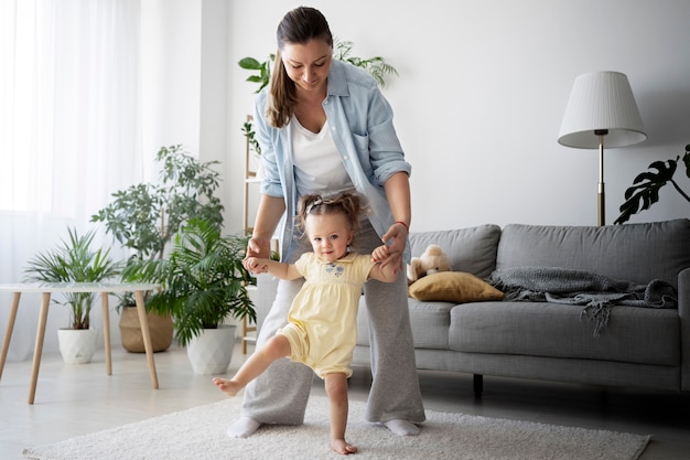 Cute baby going for their first steps