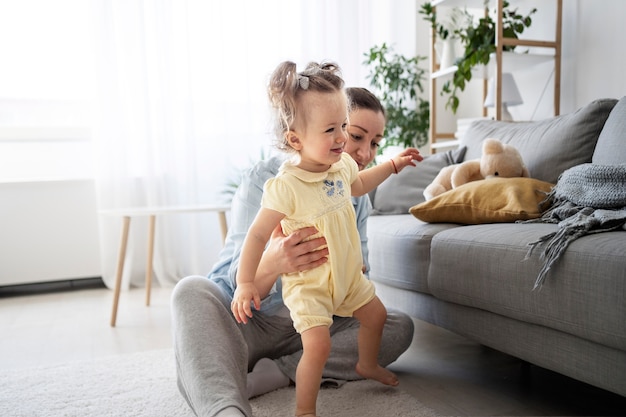 Cute baby going for their first steps