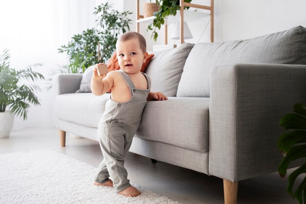 Cute baby going for their first steps