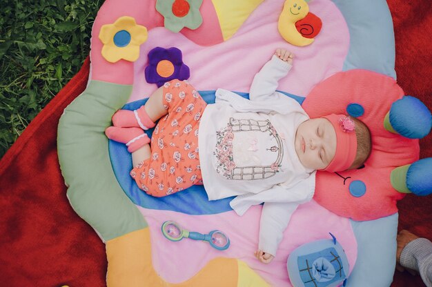 Cute baby sleeping outdoors